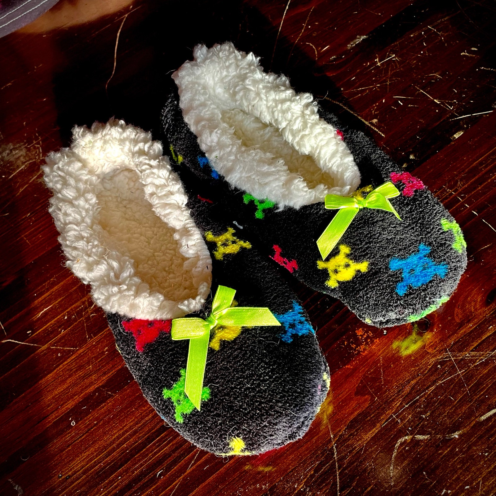 3 For $23 Black Fuzzy Slipper Socks With Multicolor Skulls